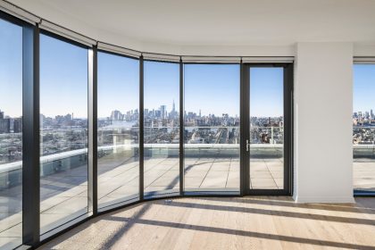  view through windows on city skyline